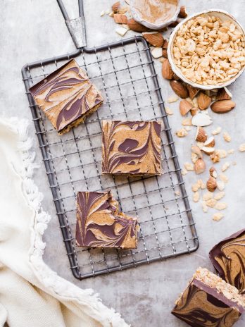 These Chocolate Almond Butter Crispy Bars are crunchy, rich, and absolutely delicious! There is no baking necessary so they're super quick and simple to make with only 7 ingredients.