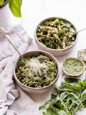 This Arugula Pesto Pasta Bowl with Broccoli is one of my favorite quick and easy go-to meals! It's filling, nutritious, and simple to make in just 30 minutes. You're going to want to put the homemade dairy-free arugula pesto on everything!