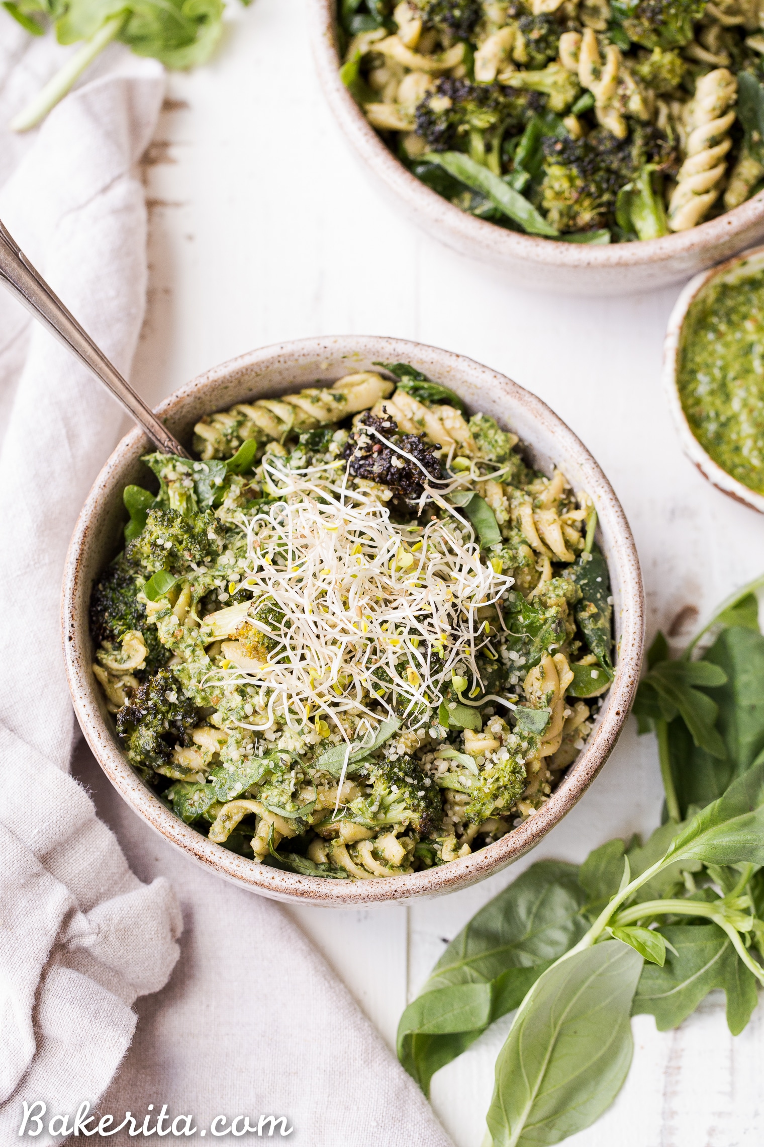 This Arugula Pesto Pasta Bowl with Broccoli is one of my favorite quick and easy go-to meals! It's filling, nutritious, and simple to make in just 30 minutes. You're going to want to put the homemade dairy-free arugula pesto on everything!
