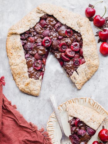 This Chocolate Cherry Galette is made with dark chocolate and fresh red cherries, all tucked into a super flaky pie crust that you would never guess is gluten-free, paleo and vegan. If you're a cherry fan, you need to try this chocolatey treat out ASAP!