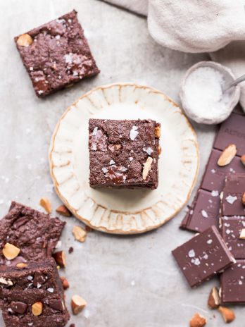 You'd never guess these super fudgy Salted Almond Brownies are gluten-free, paleo and vegan, because they taste just as good as a traditional brownie! They're incredibly fudgy and chocolatey and the toasted almonds and sea salt make them even better.