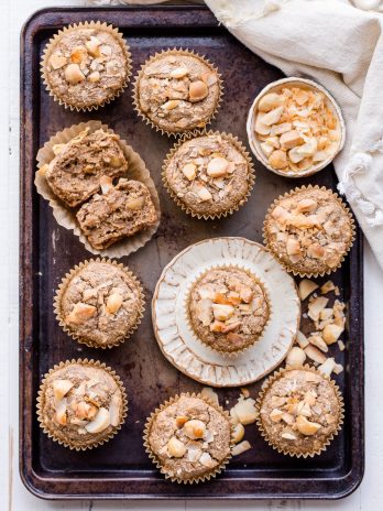 These Macadamia Nut Coconut Banana Muffins are tender, moist, and perfectly sweet for breakfast. Slathered with a little jam or nut butter, these gluten-free and vegan banana muffins make a wonderful snack or breakfast that will keep you satiated for hours.