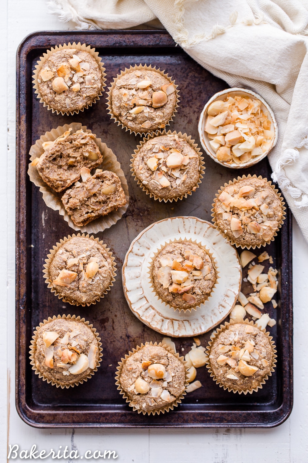 These Macadamia Nut Coconut Banana Muffins are tender, moist, and perfectly sweet for breakfast. Slathered with a little jam or nut butter, these gluten-free and vegan banana muffins make a wonderful snack or breakfast that will keep you satiated for hours.