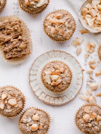 These Macadamia Nut Coconut Banana Muffins are tender, moist, and perfectly sweet for breakfast. Slathered with a little jam or nut butter, these gluten-free and vegan banana muffins make a wonderful snack or breakfast that will keep you satiated for hours.