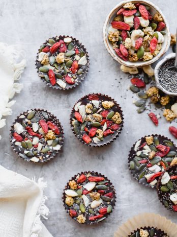 These Superfood Cacao Fudge Bites are creamy, so rich in cacao flavor, and topped with all sorts of delicious superfoods, like cashews, goji berries, chia seeds, and more. They'll satisfy your candy craving and they're gluten-free, paleo, and vegan!