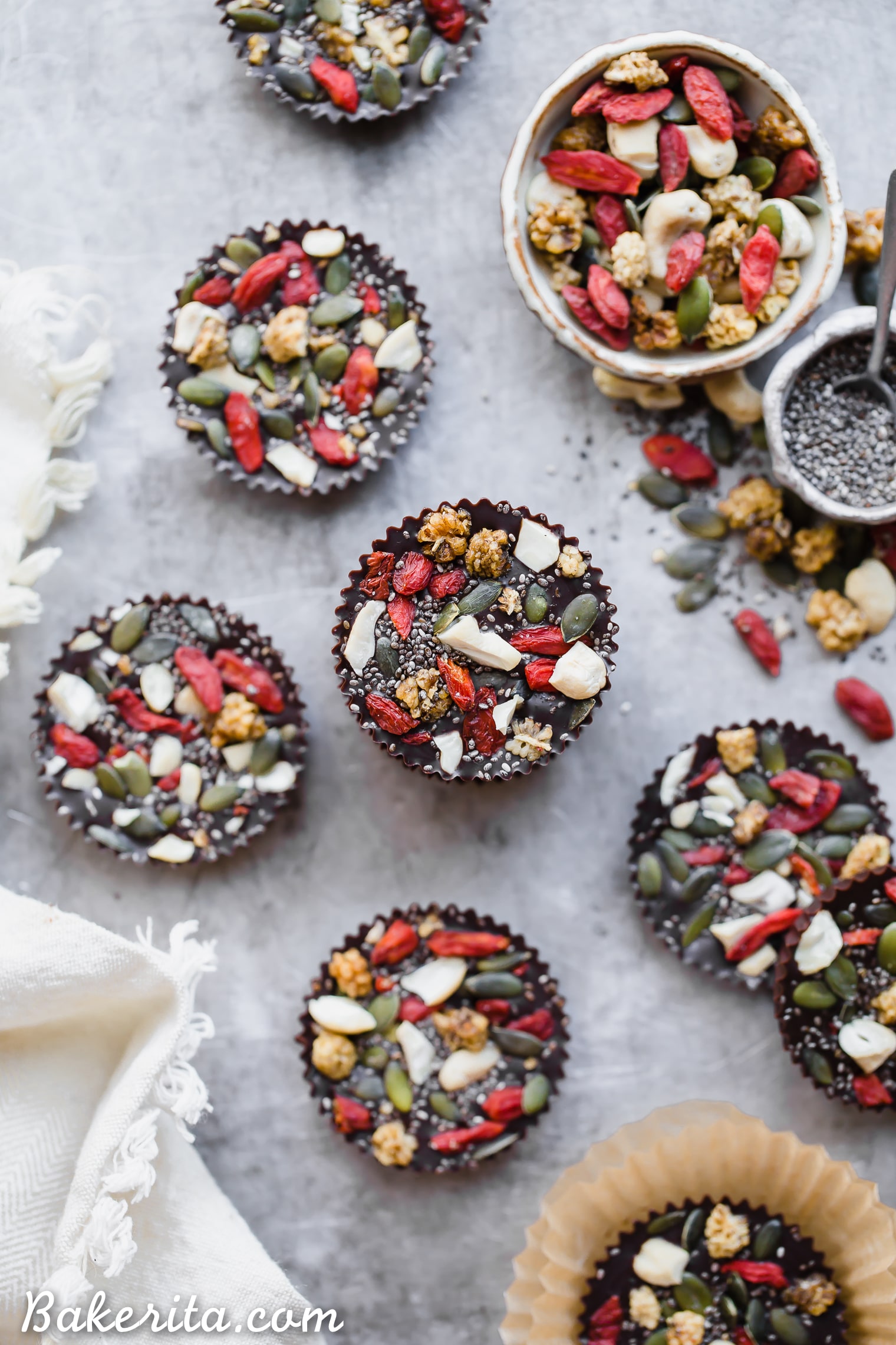 These Superfood Cacao Fudge Bites are creamy, so rich in cacao flavor, and topped with all sorts of delicious superfoods, like cashews, goji berries, chia seeds, and more. They'll satisfy your candy craving and they're gluten-free, paleo, and vegan!