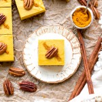 These No Bake Golden Milk Cheesecake Bars are a dessert that's loaded with the anti-inflammatory benefits of turmeric and the warmth and comfort of golden milk. They're deliciously spiced, gluten-free, paleo, vegan, and perfect for sharing.