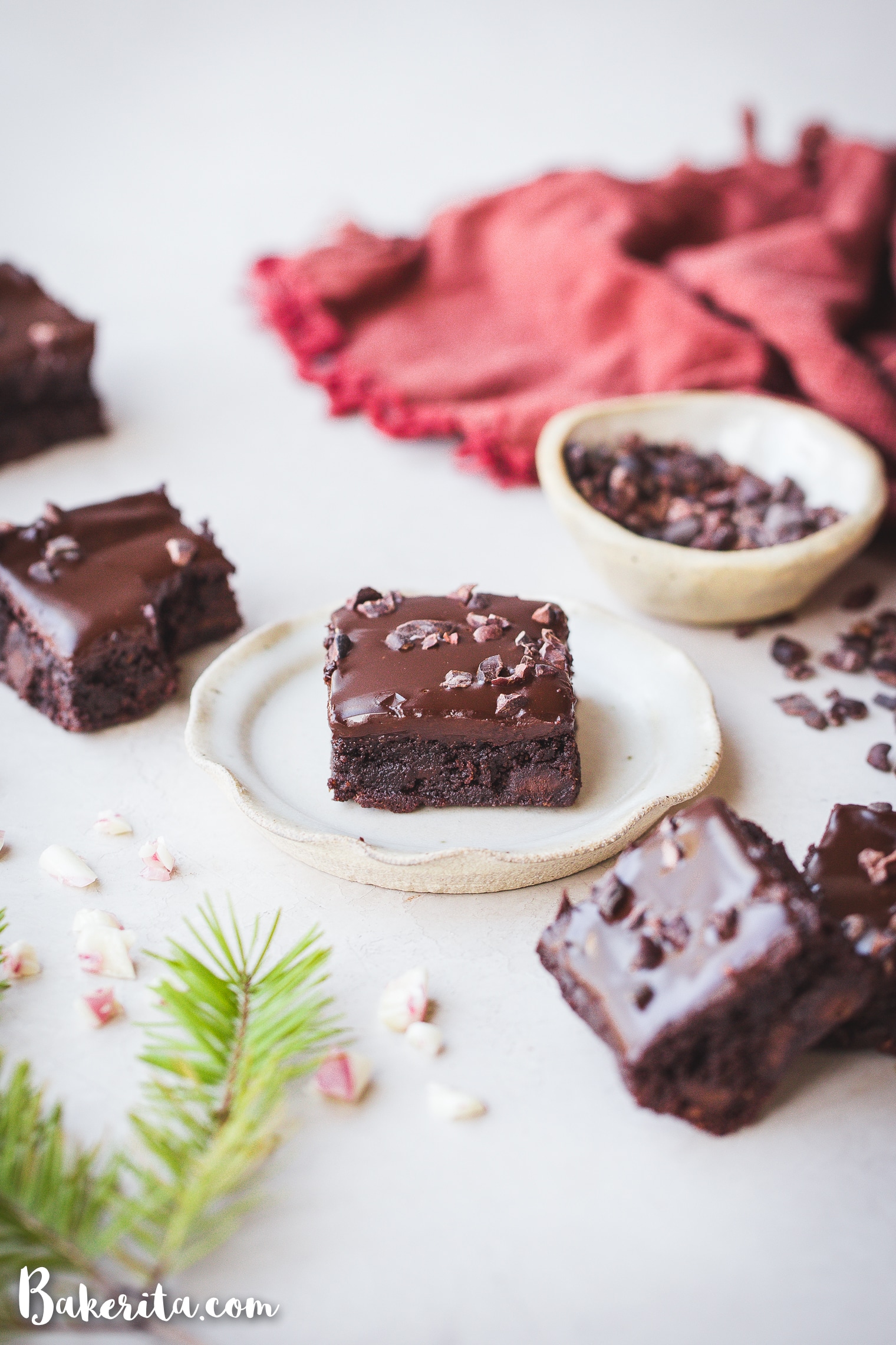 These Peppermint Brownies are so rich & fudgy, flavored with pure peppermint extract, and topped with luscious dark chocolate ganache. The paleo & vegan brownies are full of dark chocolate chips and cacao nibs.