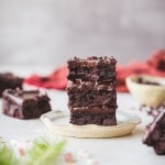 These Peppermint Brownies are so rich & fudgy, flavored with pure peppermint extract, and topped with luscious dark chocolate ganache. The paleo & vegan brownies are full of dark chocolate chips and cacao nibs.