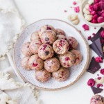 These Raspberry Dark Chocolate Energy Bites are deliciously filling and laced with the bold flavor of raspberries and shards of dark chocolate. They make the perfect gluten-free, paleo, and vegan snack or treat.