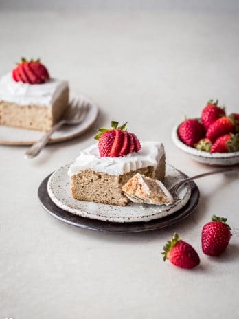 This Gluten-Free Tres Leches Cake is soaked with evaporated coconut milk & sweetened condensed coconut milk to make a dairy-free version of this classic Latin American dessert. The paleo vanilla sponge cake is deliciously moist and topped with whipped coconut cream. It is dairy-free with a vegan option.