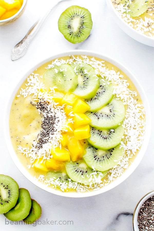 Mango Kiwi Chia Seed Smoothie Bowl (V+GF): a super easy recipe for a light, refreshing and filling smoothie bowl full of mangoes and topped with kiwis. Vegan and Gluten Free.