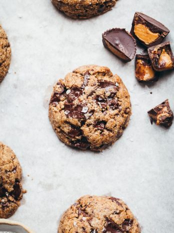 You need to try these delicious Peanut Butter Chocolate Chip Cookies - they're full of chopped up mini peanut butter cups that we fold into the dough along with the dark chocolate chunks! You'll love these gluten-free, grain-free, refined sugar-free, and vegan cookies. 