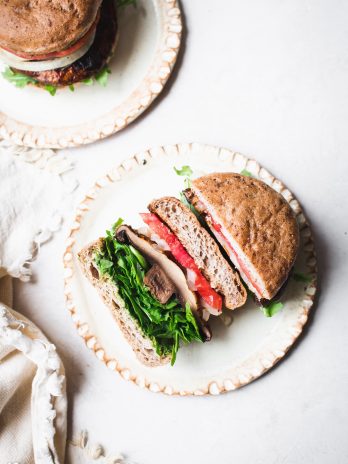 These Vegan Grilled Portobello Mushroom Burgers are packed with umami flavors thanks to the scrumptious marinade. When piled high with additions like grilled onions and vegan pesto, it's a burger you'll want to make every weekend. The grilled portobello mushrooms are also perfect as a side dish all on their own.