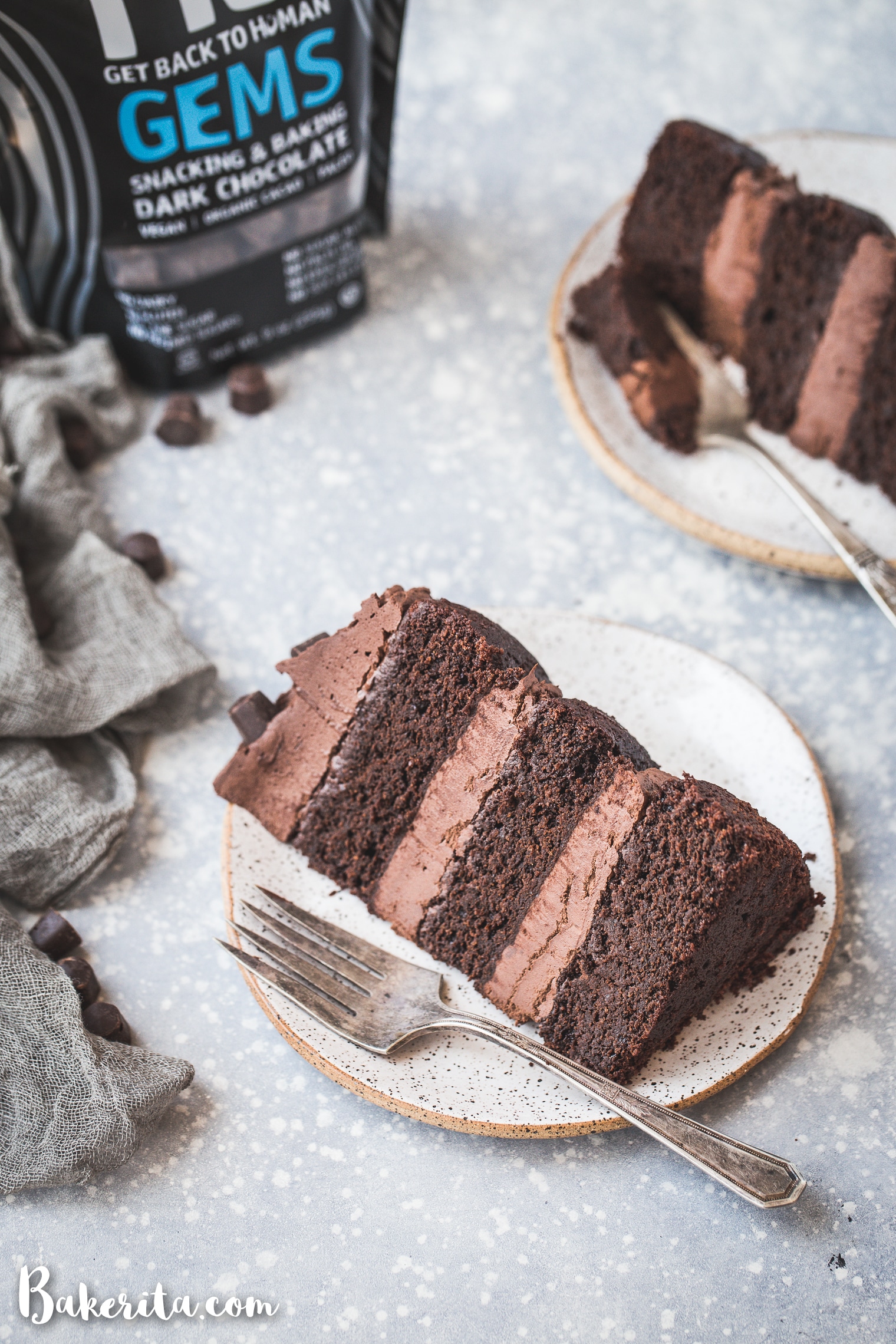 Paleo Chocolate Cake with Vegan Chocolate Ganache Frosting - a quick and easy cake recipe with a simple 2-ingredient frosting! This layer cake is gluten-free, paleo, dairy-free, and vegan, and it tastes as decadent as your favorite chocolate cake.