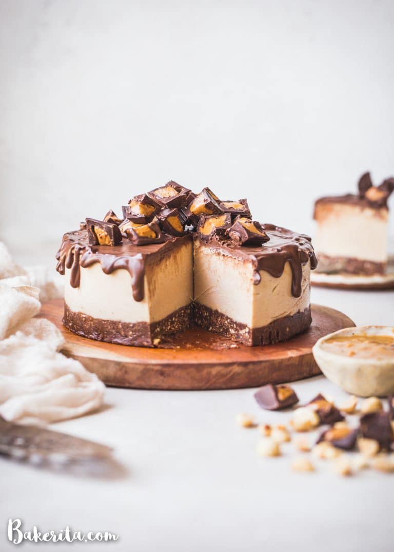 This Gluten-Free Vegan Peanut Butter Cup Cheesecake tastes like your favorite candy turned into a delightfully creamy vegan cheesecake. With a chocolate crust, creamy peanut butter filling, and chocolate ganache topping, you won't be able to have just one bite!
