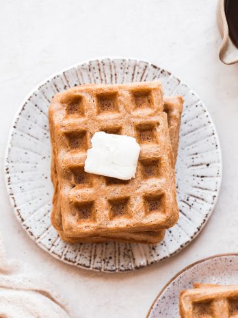 These Paleo Vegan Waffles are incredibly light, crispy, and best of all - easy to make! They're gluten-free, egg-free, and can easily be frozen for a quick breakfast.