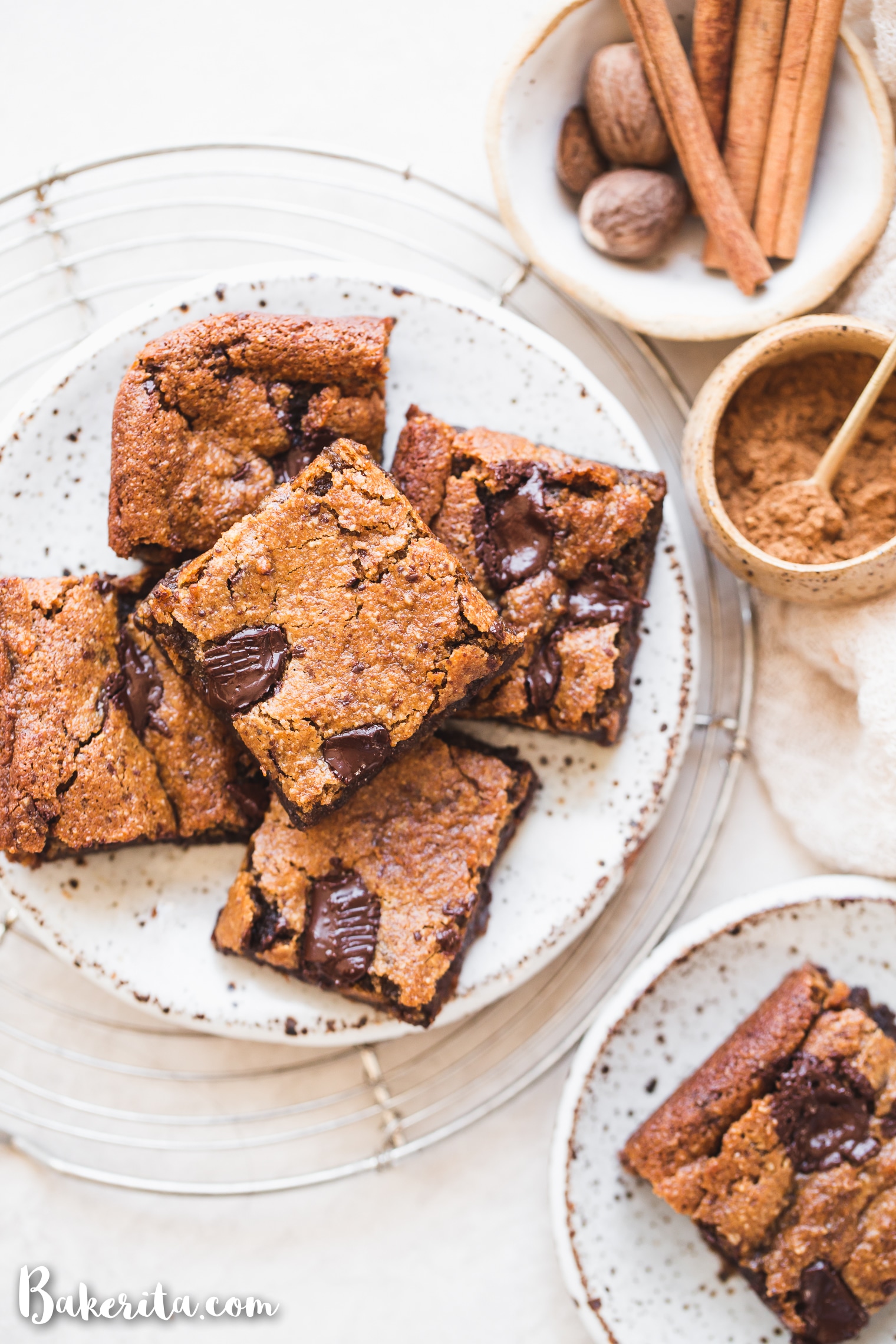 These Gluten-Free Vegan Sweet Potato Blondies taste like fall in a bar cookie! With warm spices and dark chocolate chunks, these decadent blondies will satisfy your fall dessert cravings.