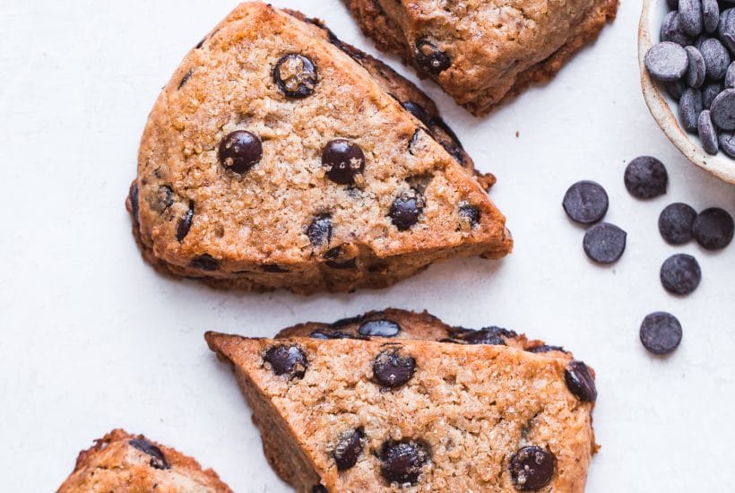 These Vegan Gluten-Free Chocolate Chip Scones are everything a good scone should be: tender and fluffy on the inside, with a crispy, slightly crumbly exterior. These paleo scones are loaded with chocolate chips and make for a delicious breakfast, snack, or dessert.