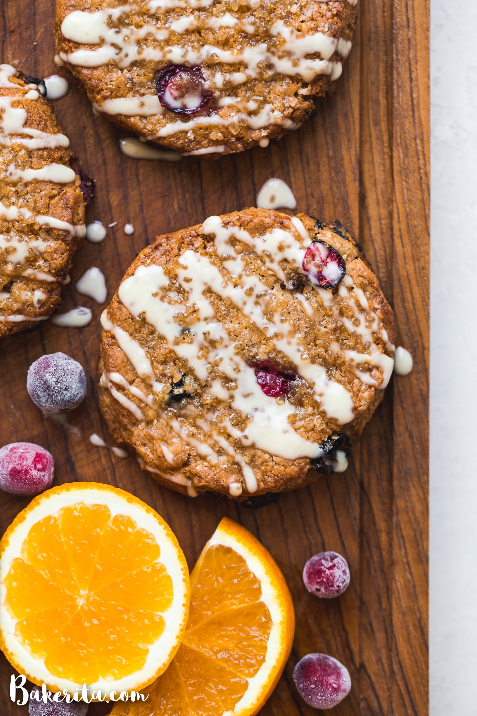 These Gluten-Free Vegan Cranberry Orange Scones will be your new favorite vegan breakfast. This easy scone recipe is made with fresh and dried cranberries, fresh orange juice and zest, and a simple orange glaze for maximum flavor.