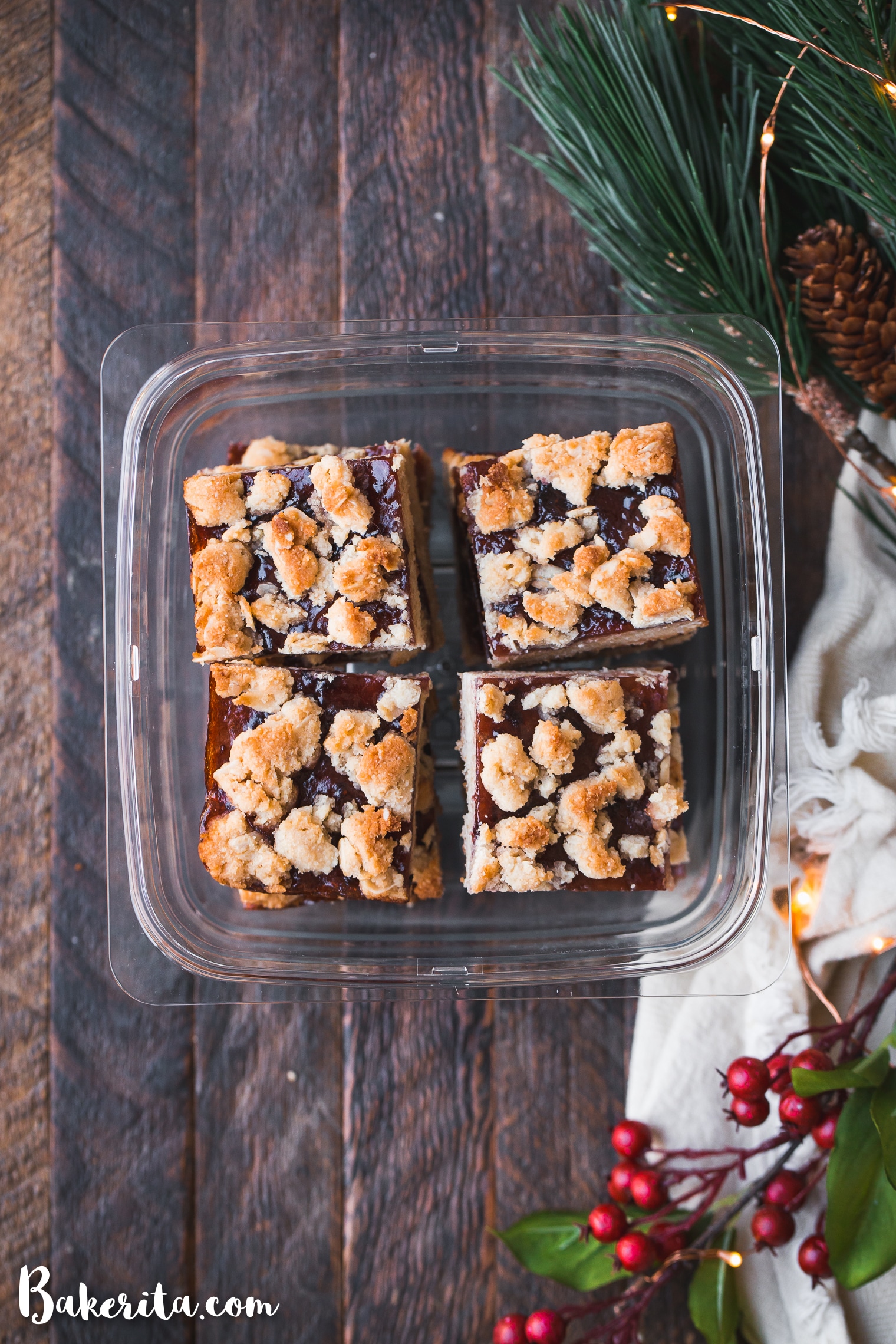 These Gluten-Free Vegan Jam Bars are made with a scrumptious oatmeal crumble crust that doubles as a crumb topping and a thick layer of jam in the middle. They're the perfect easy, vegan holiday dessert.