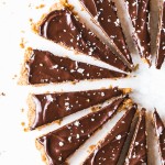 This Gluten-Free Vegan Shortbread recipe tastes rich and buttery - without the butter. This simple recipe is made with just FOUR ingredients and can be topped with chocolate for an extra-special holiday treat.