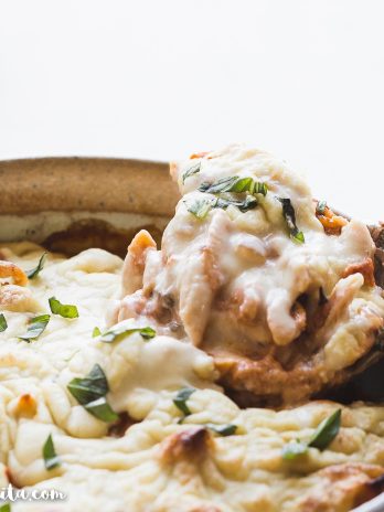 How to make Vegan Baked Ziti that's creamy, cheesy, and absolutely delicious! It's made with gluten-free noodles, marinara sauce, easy vegan ricotta cheese, and homemade vegan mozzarella sauce.