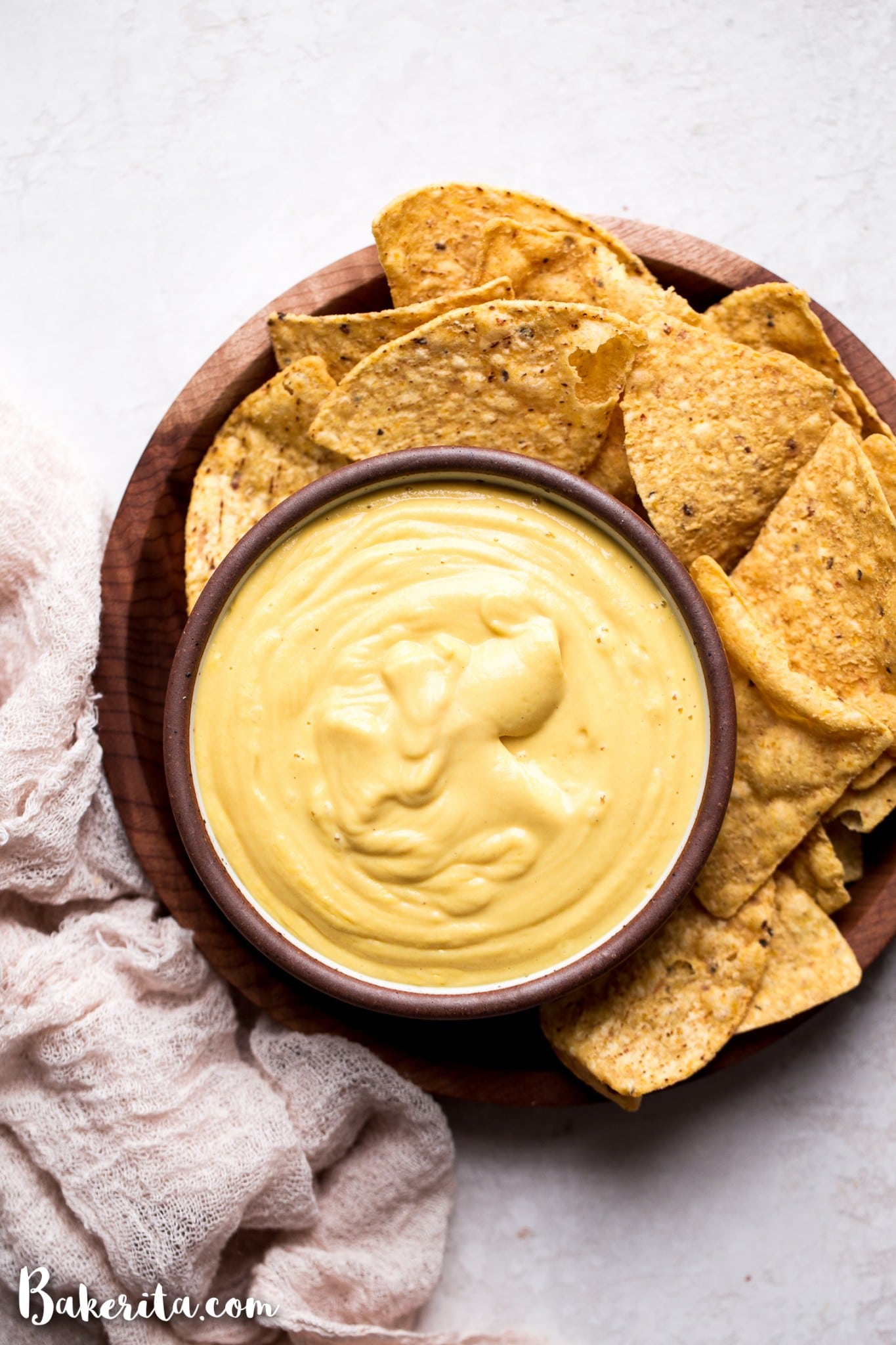 This Vegan Cheese Sauce recipe is easy to make and tastes good on just about everything! It's made with vegetables and cashews for an oil-free, dairy-free cheese sauce. You'll love it with pasta or vegetables, on nachos, and taco bowls, or used as a dip with chips or veggies.