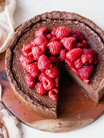 This Baked Vegan Chocolate Cheesecake will make your mouth water! It's super creamy and delicious, with a rich chocolate flavor and a tasty gluten-free chocolate crust.