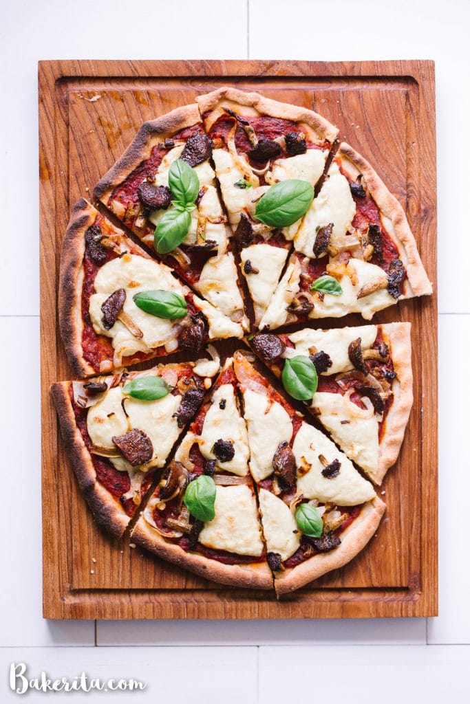You'll be surprised at how easily this Gluten-Free Vegan Pizza with Mushrooms & Onions comes together! It is made with my new favorite gluten-free pizza crust and topped off with tomato sauce, homemade vegan mozzarella cheese, mushrooms and onions. Perfect for pizza night!