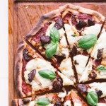 You'll be surprised at how easily this Gluten-Free Vegan Pizza with Mushrooms & Onions comes together! It is made with my new favorite gluten-free pizza crust and topped off with tomato sauce, homemade vegan mozzarella cheese, mushrooms and onions. Perfect for pizza night!