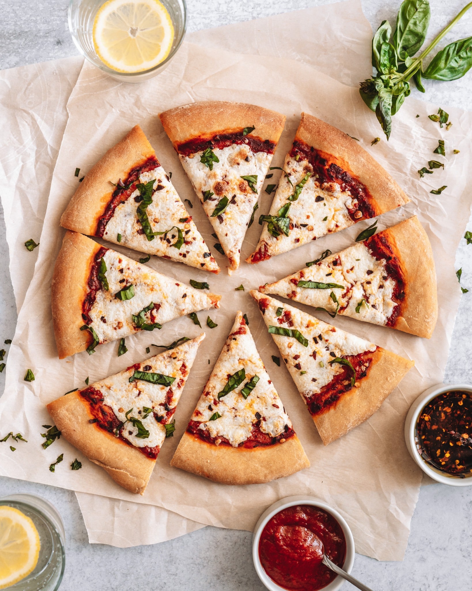 If you’re looking for a vegan pizza recipe that’s simple to make and oh-so-delicious, you’re in the right place! This Vegan Margherita Pizza is made with a healthy, homemade whole-wheat crust, and topped with vegan mozzarella, tomatoes, and fresh basil. The classics never go out of style! There’s a reason they’re called classics, after all.