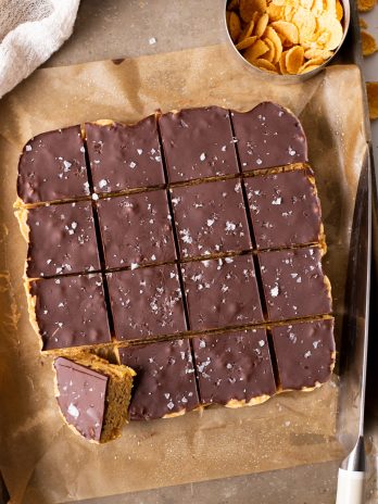 These Easy Peanut Butter Cornflakes Bars are naturally gluten-free, vegan, and absolutely irresistible. They're quick and simple to make, and can be made using your favorite nut or seed butter if you need a peanut-free or nut-free option. 