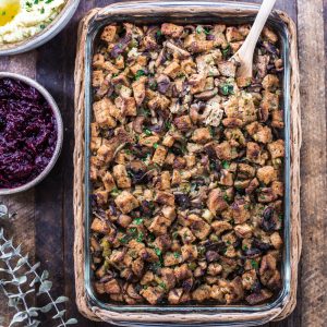 This Vegan Mushroom Stuffing is loaded with wild mushrooms, onions, sage, and thyme, for a fantastic holiday side dish that your whole family will love. This easy stuffing recipe can easily be made into a gluten-free stuffing, as well.