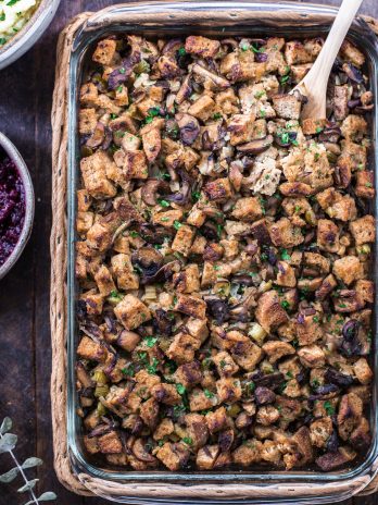 This Vegan Mushroom Stuffing is loaded with wild mushrooms, onions, sage, and thyme, for a fantastic holiday side dish that your whole family will love. This easy stuffing recipe can easily be made into a gluten-free stuffing, as well.