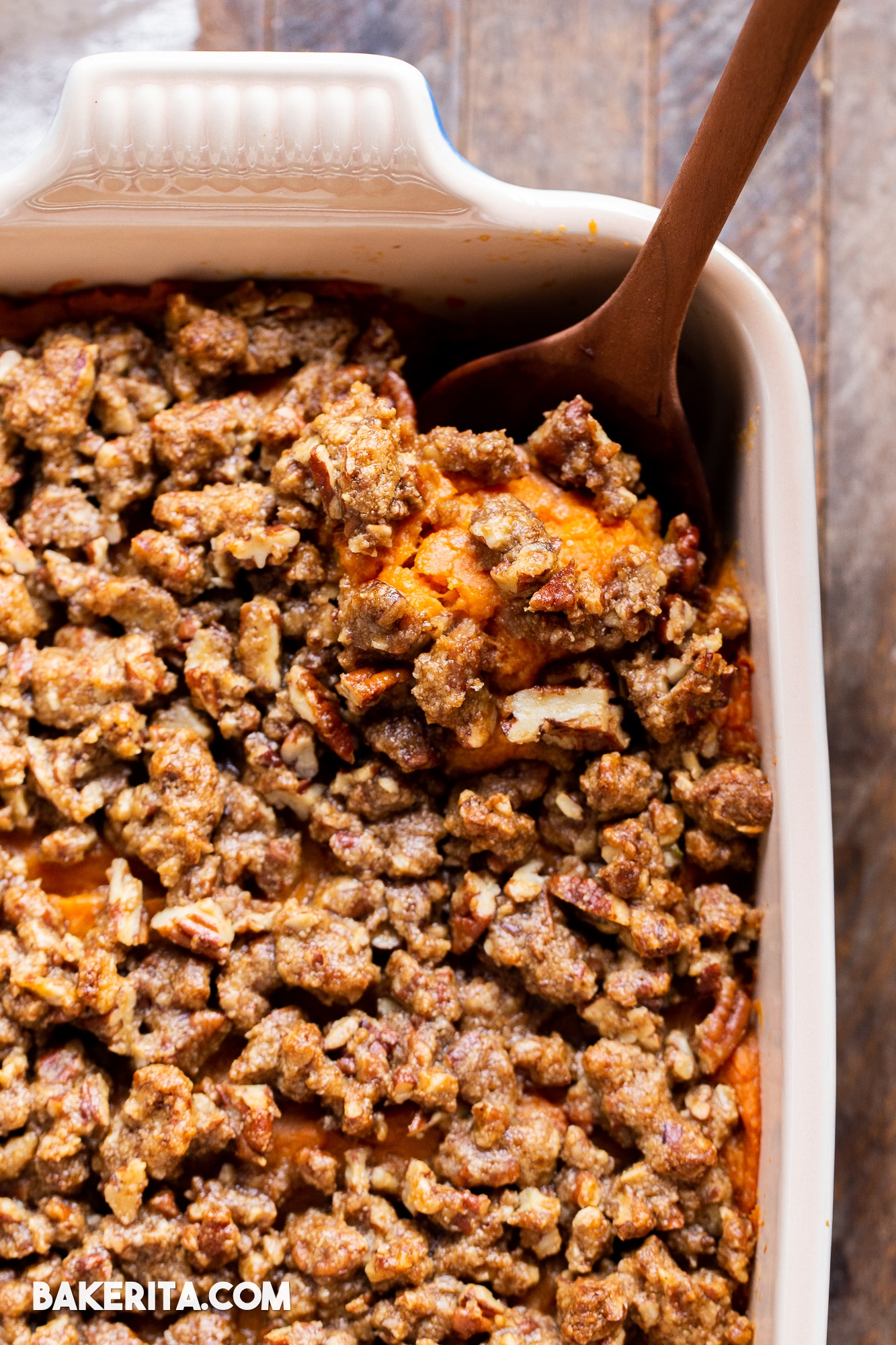 This Vegan Sweet Potato Casserole with Gluten-Free Pecan Crumble recipe is the best sweet potato casserole ever! It's made with fresh yams and coconut sugar for subtle sweetness that pairs perfectly with the rest of your holiday meal. With a crispy gluten-free pecan crumble topping, you'll definitely be serving yourself seconds. It's easy to make the day of, or can be prepared in advance for an easy make-ahead holiday side dish.