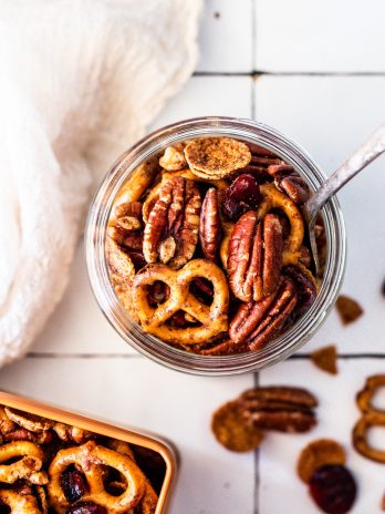 This Healthy Pumpkin Spice Snack Mix is crunchy, sweet, and SO easy to make with just seven ingredients! It's perfect for snacking on, using as a crunchy topping, or giving as a gift.