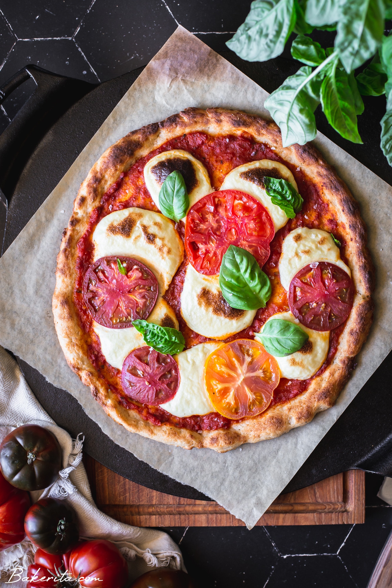 This Gluten-Free Sourdough Pizza Crust requires just six ingredients, 10 minutes, and one bowl needed to mix up the dough! This easy sourdough discard pizza dough recipe is also vegan, and couldn't be easier to make.
