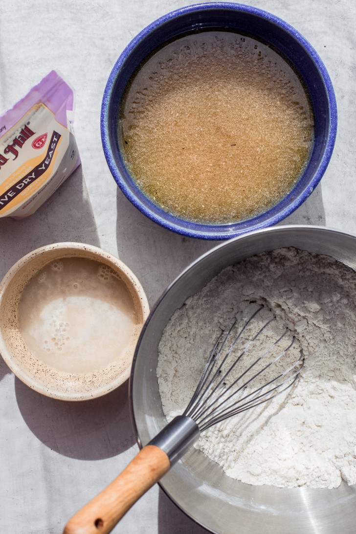 Activated yeast, psyllium husk gel, and gluten-free flour blend for a gluten-free bread recipe.