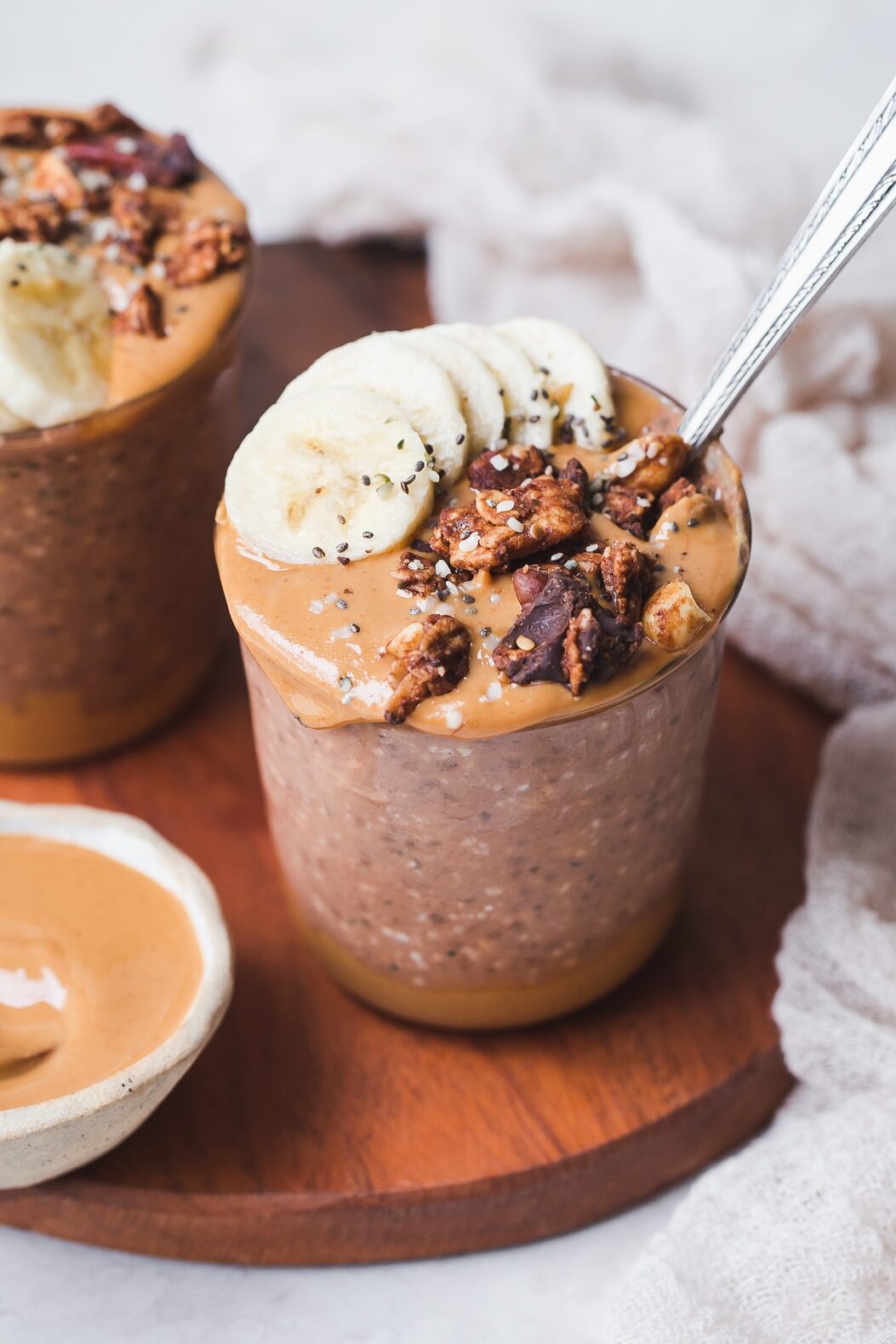 Make breakfast better with this Chocolate Peanut Butter Overnight Oats recipe! Gluten-free, vegan, and made in just 5 minutes, this is an easy make-ahead breakfast you'll make all the time.