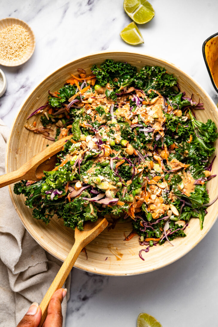 Rachel Connors headshot in a red shirt.
